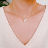 Collar de una sola perla y diamantes