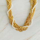 Collar de perlas con múltiples cadenas
