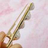 Juego de pasadores para el pelo con cadena de mármol y perlas