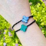 Bracelet extensible semi-précieux avec croix arrondie