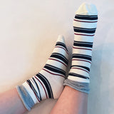 Bold and stylish set of two socks featuring edgy striped patterns and sassy color combinations—perfect for adding attitude and flair to any outfit.