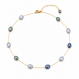 Pearl necklace with gold chain on a white background