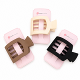 Set of four silicone sanding tools in pink packaging on a white background