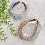 Diadema con pliegues brillantes