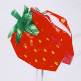 Cute and colorful strawberry-shaped hair claw clip with a glossy finish, perfect for adding a fresh and playful touch to any hairstyle.