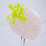 Cute and colorful strawberry-shaped hair claw clip with a glossy finish, perfect for adding a fresh and playful touch to any hairstyle.