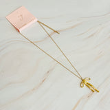 Collar con colgante de lazo estilista