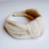 Diadema anudada con nube acogedora