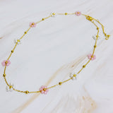 Collier de perles romantique champ de fleurs