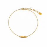 gold chain with side hanging fish charm on white background