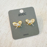 Delicate gold heart-shaped stud earrings adorned with a silver bow accent—perfect for adding a touch of charm and elegance to any look.