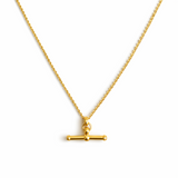 A polished gold chain necklace featuring a T-bar pendant drop at the center. The design highlights a modern, structured silhouette with timeless charm and a subtle statement finish