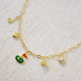 Gold chain necklace featuring charming golf-themed pendants, including a golf club, golf ball, flag, and green, making it a perfect accessory for golf enthusiasts.
