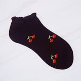 Playful set of three socks featuring cherry and heart motifs in fun, perfect for adding a cute and fruity flair to your everyday style.