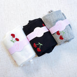 Playful set of three socks featuring cherry and heart motifs in fun, perfect for adding a cute and fruity flair to your everyday style.