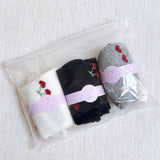 Playful set of three socks featuring cherry and heart motifs in fun, perfect for adding a cute and fruity flair to your everyday style.