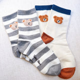Adorable set of two socks featuring cheerful bear graphics and playful text—adding a fun and cozy vibe to any casual outfit.