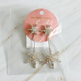 Pendientes llamativos con forma de estrella doble
