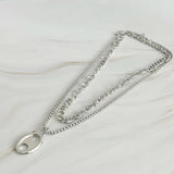 Conjunto de collar dorado con dije de botón