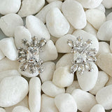 Aretes con joya con costra brillante