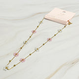 Collier de perles romantique champ de fleurs