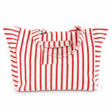 Oversized beach bag made from plush terry cloth material, designed with sturdy handles and a spacious interior—perfect for carrying towels, swimwear, and summer essentials in cozy, absorbent style.