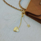 White lace ribbon bag charm with dangling gold heart charm – romantic vibe