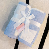 Soft blue and white checkered blanket featuring a charming leafy lemon design in vibrant yellow and green accents, perfect for adding a refreshing, cozy touch to any room.