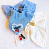 Set of two square hair scrunchies featuring cherry print and love-themed designs.