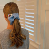 Set of two square hair scrunchies featuring cherry print and love-themed designs.