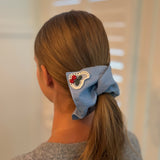 Set of two square hair scrunchies featuring cherry print and love-themed designs.