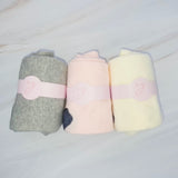 Set of three socks each featuring a charming bow detail on the back, adding a sweet and feminine accent to any look.
