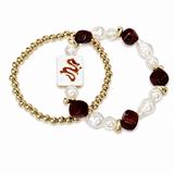 Two beaded stretch bracelets on a white background. One bracelet features gold-tone beads and white pearl-like beads with dark reddish-brown faceted beads.