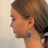 Dolphin-themed earrings featuring a dolphin design in a graceful, curved shape—perfect for a sweet, ocean-inspired look.