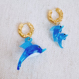 Dolphin-themed earrings featuring a dolphin design in a graceful, curved shape—perfect for a sweet, ocean-inspired look.