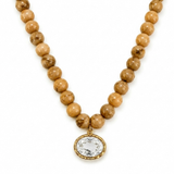 Necklace with brown beads and a gold pendant on a white background