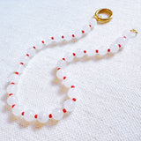 Delicate necklace featuring soft milk-toned stone beads—offering a moonlit, earthy elegance perfect for everyday or layered looks