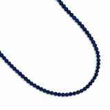 Single strand necklace featuring natural stone beads in warm, earthy tones with subtle color variations and organic shapes, offering a bohemian and grounded look perfect for everyday wear or layering.