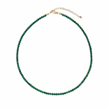 Single strand necklace featuring natural stone beads in warm, earthy tones with subtle color variations and organic shapes, offering a bohemian and grounded look perfect for everyday wear or layering.