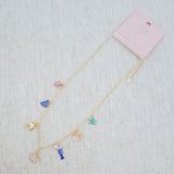 Gold brass necklace with colorful fish, shell, and sea animal charms