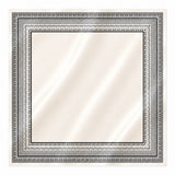 Decorative mirror with a black frame on a white background