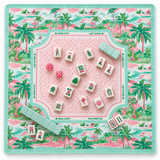 Mahjong game set with a tropical beach-themed board, featuring pink and mint green tiles, white tiles with colorful Chinese characters, and several dice, arranged on a matching printed mat.