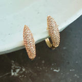 Gold mini hoop earrings with curved wave texture – simple yet elegant design