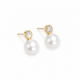 Gold stud earrings featuring round clear crystal accents paired with glossy white pearl drop details in a classic and elegant design on a white background