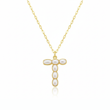 Gold necklaces with pearl beads on a initial pendant T with white background