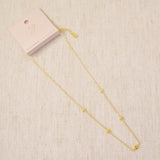 Delicate gold-tone necklace featuring evenly spaced petite chain links for a minimal and elegant look.