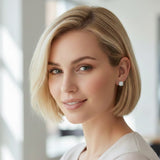 Set of two hexagon-shaped scarf magnetic brooch pins or earrings with a modern, abstract design. Each brooch features a sleek finish and sculptural angles, offering a stylish and functional accent for securing scarves or accessorizing garments.