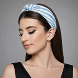 Textured fabric twist knot headband with a structured silhouette and soft-touch finish, designed to elevate both everyday and dressed-up outfits with a polished, stylish look.