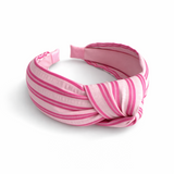 Textured fabric twist knot headband with a structured silhouette and soft-touch finish, designed to elevate both everyday and dressed-up outfits with a polished, stylish look.