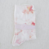 Soft and stylish socks adorned with delicate watercolor-inspired florals, offering a dreamy and romantic touch to everyday wear.